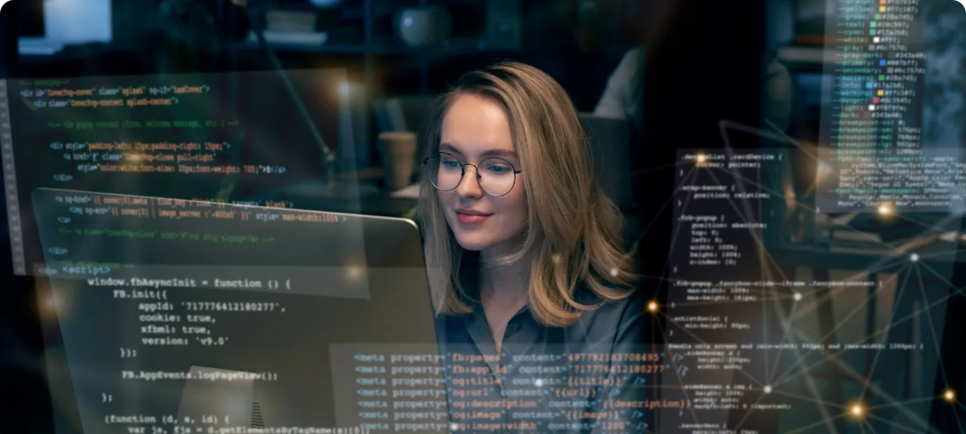 Developer working with code projected across the screen